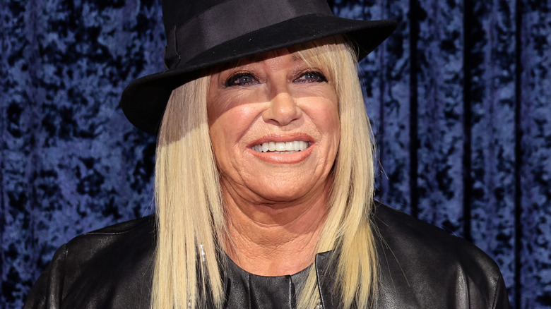 Suzanne Somers wearing a black hat