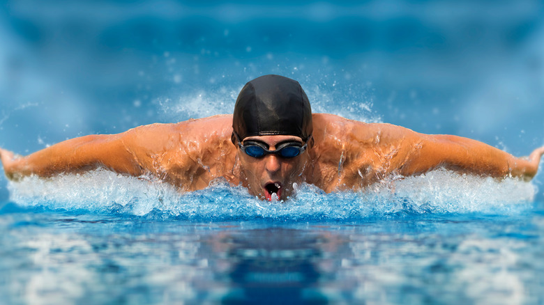 man butterfly swim stroke