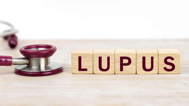 Wooden blocks spelling out "lupus"