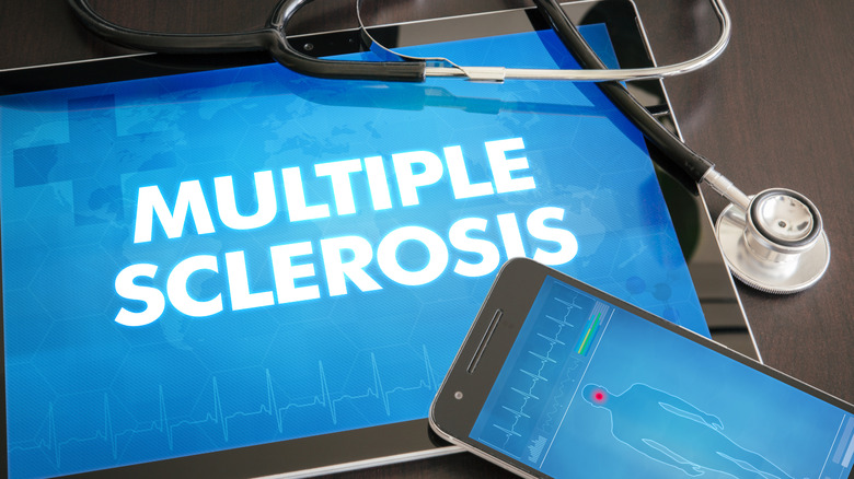 A tablet that says "MULTIPLE SCLEROSIS" 