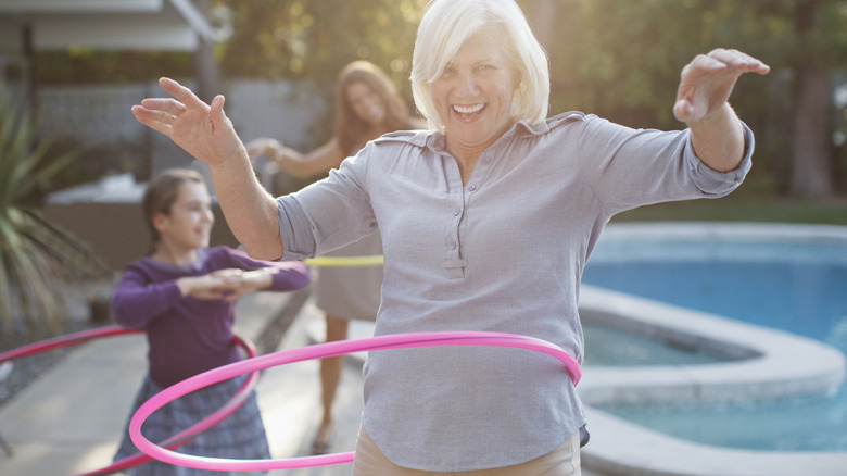 senior woman with a hoola hoop