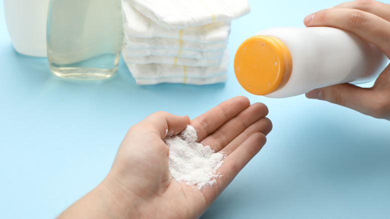 A hand with talcum powder