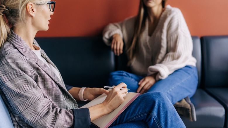 a woman sits for talk theapy 