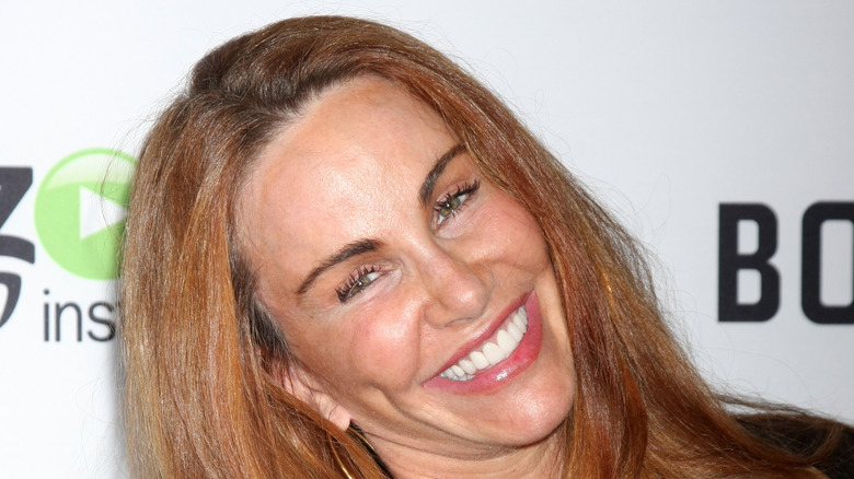 Tawny Kitaen smiling