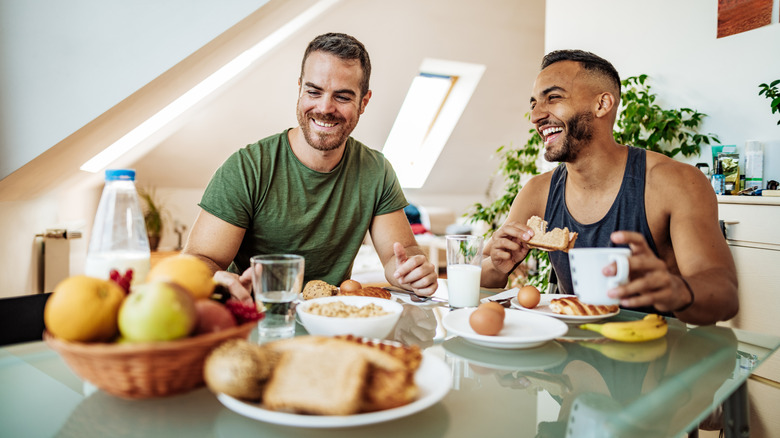 Two men having breakfast together