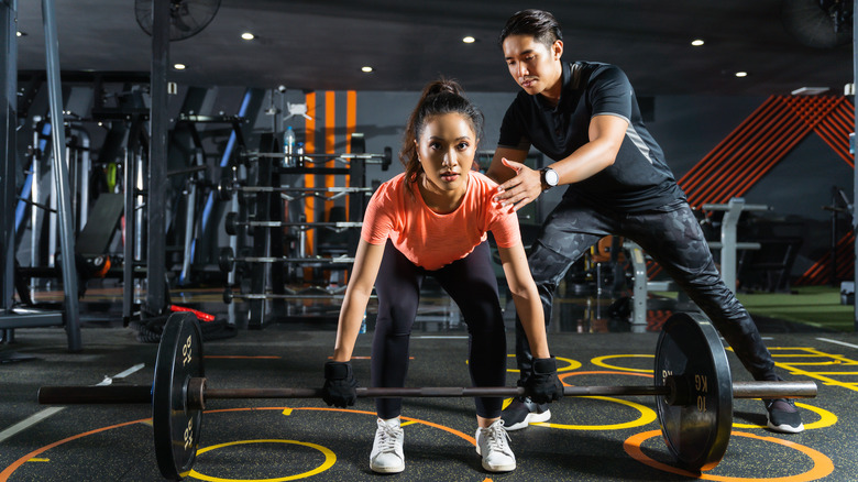 Woman doing deadlifts