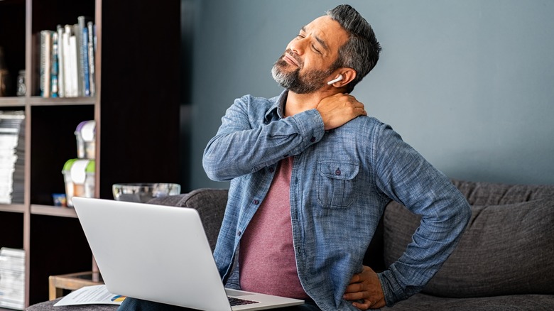 Man experiencing shoulder pain