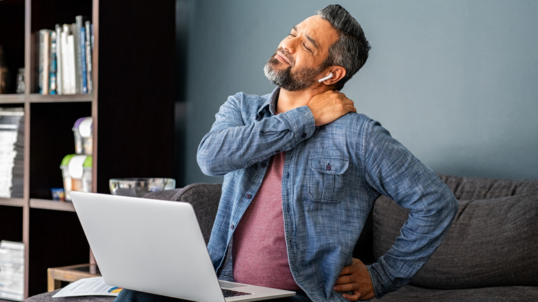 Man experiencing shoulder pain