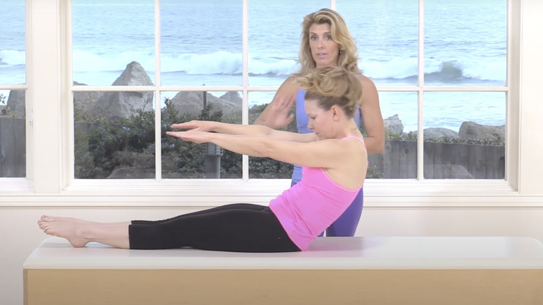 woman doing roll up