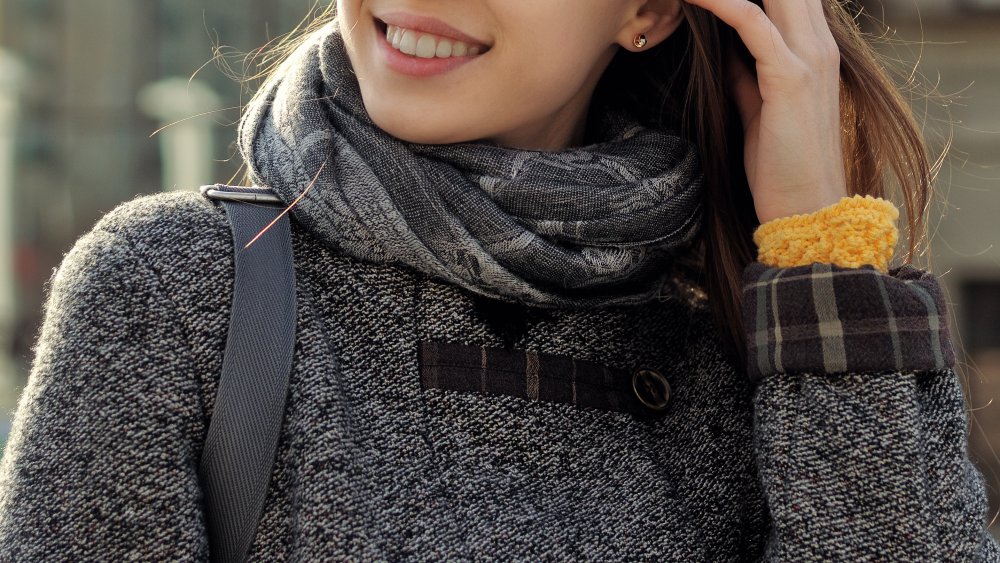 woman with scarf on her neck