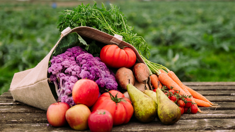 Burlap sack full of fruits and vegetables