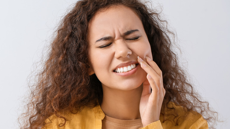 woman with tooth pain 