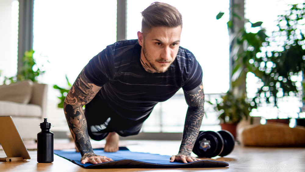 man doing pushup at home