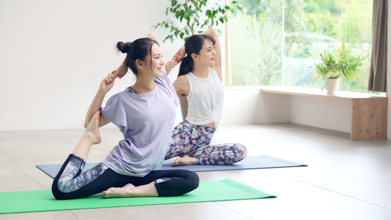 women doing yoga