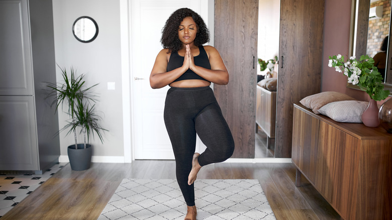 woman practicing yoga