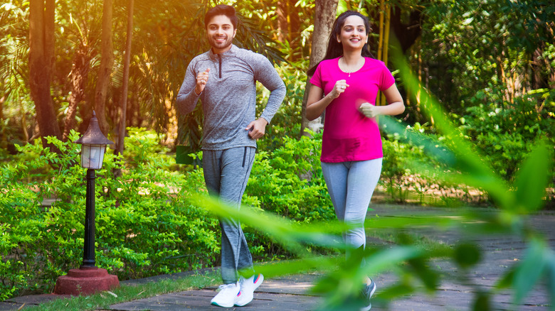 couple outside jogging