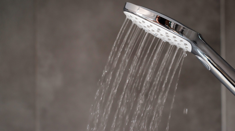 Close up of water flowing from shower head