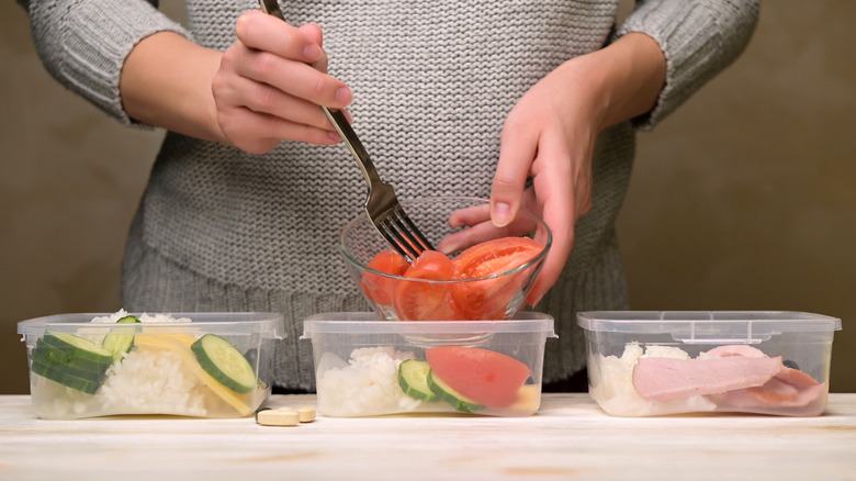 Woman preparing her meals for the day