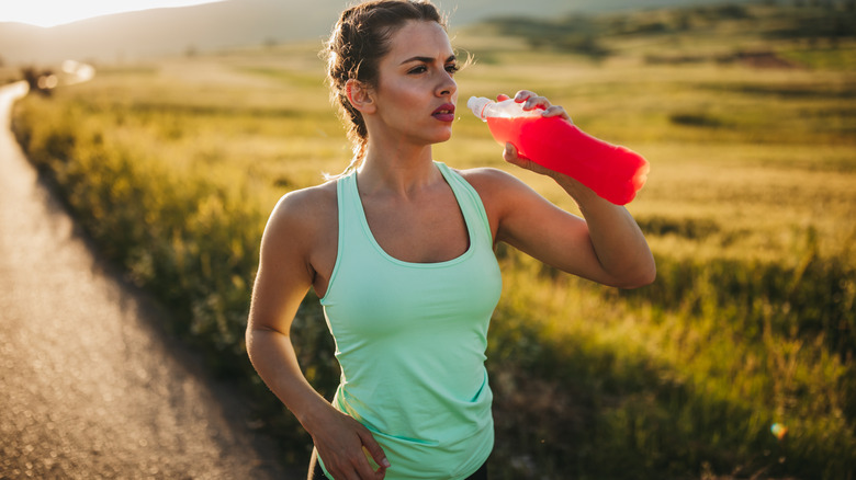 Woman drinking energy drink