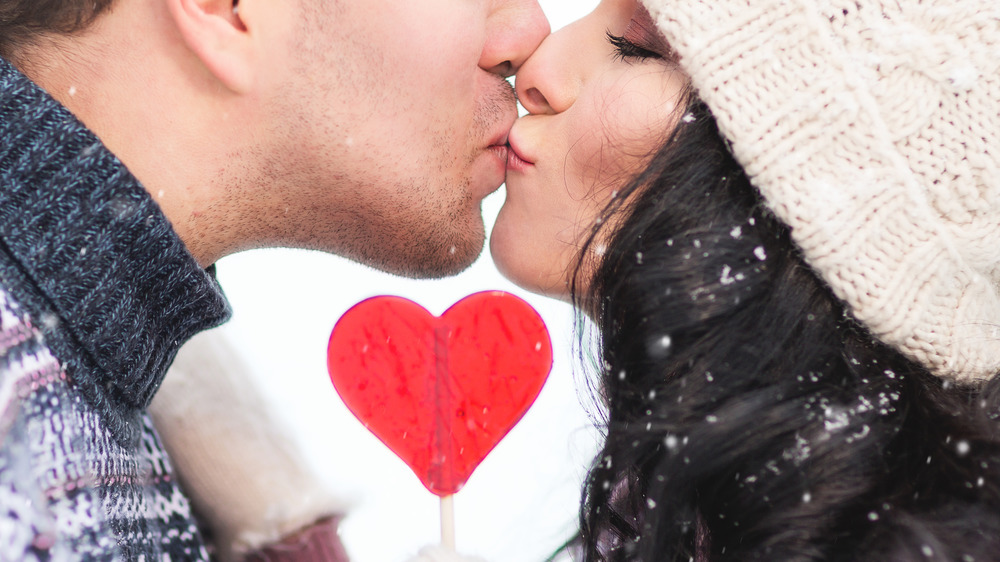 Couple kissing, lips