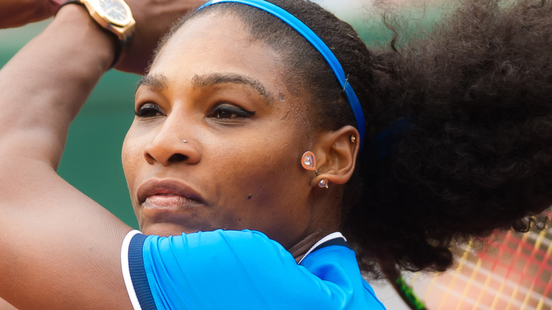 Serena Williams hitting a tennis ball