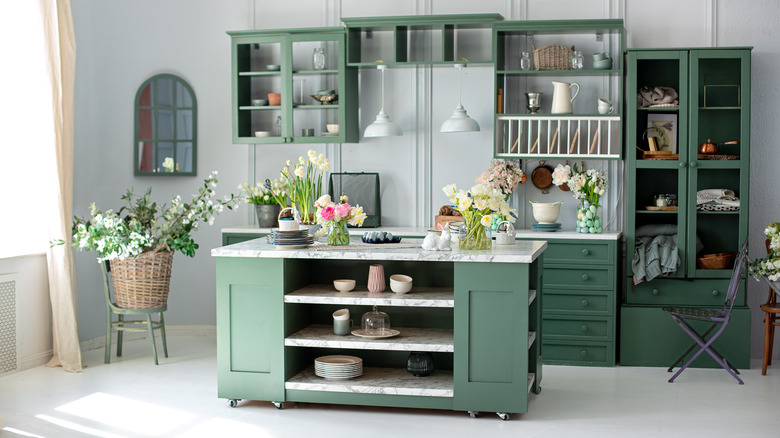 photo of a green and white kitchen 