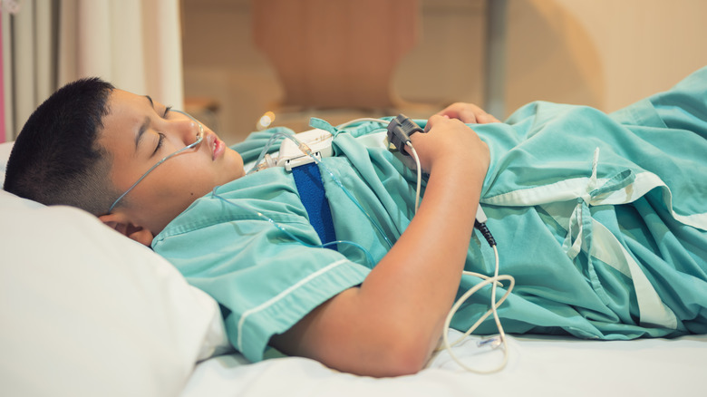 boy with sleep apnea during sleep study