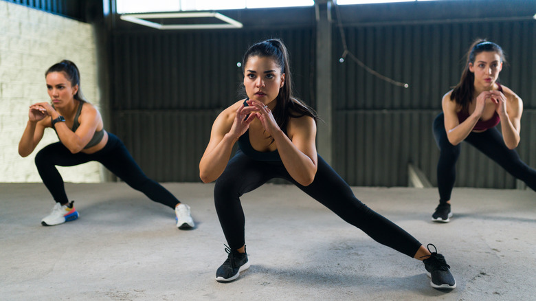 women doing lateral lunges