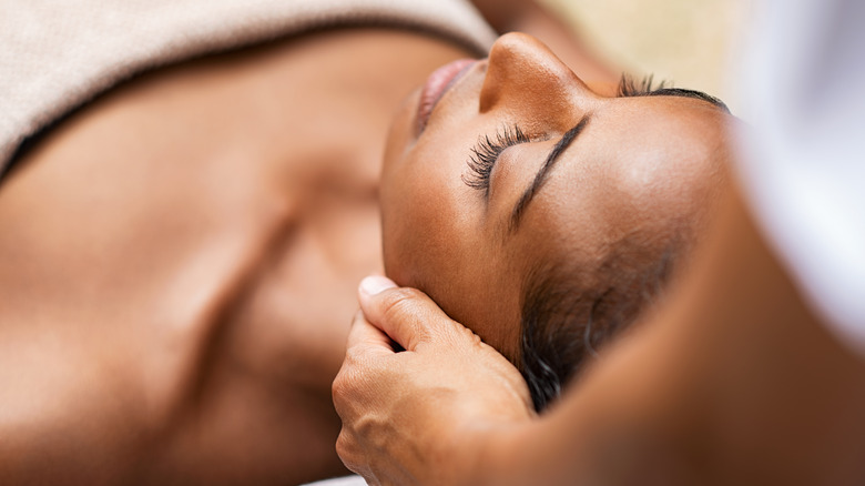 Woman getting a face massage