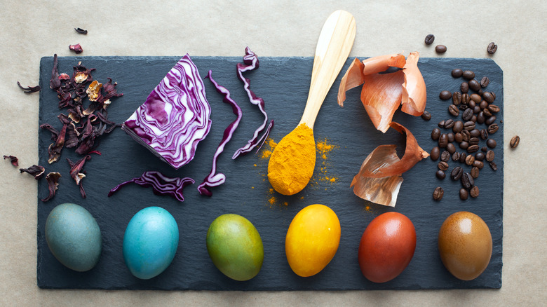 Radishes, turmeric, coffee beans, and other natural foods next to similarly-colored eggs