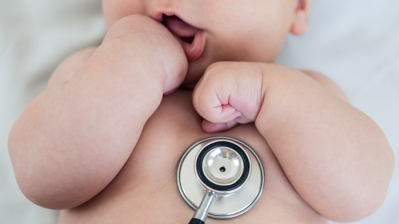 Stethoscope on baby's chest