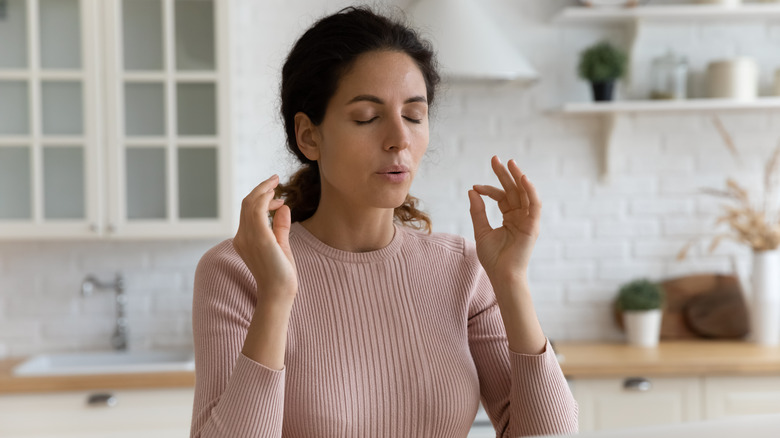 Woman being mindful of her breathing