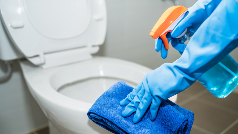 cleaning a toilet