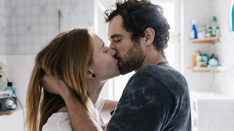 two people passionately kissing