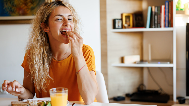 Woman having breakfast