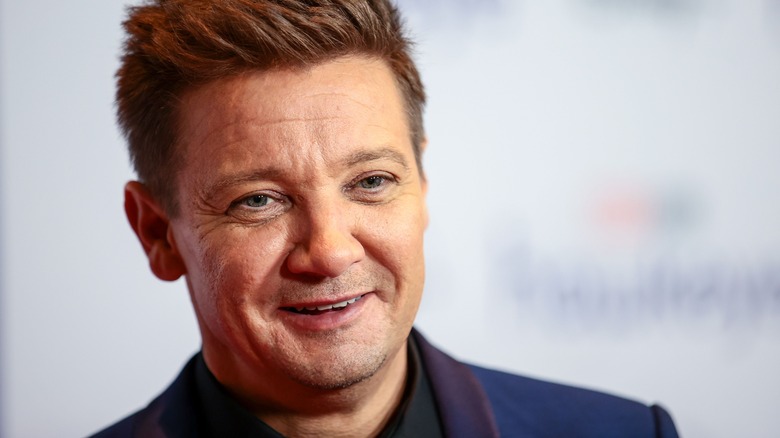 Jeremy Renner smiling at film screening