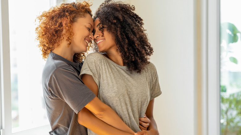 Smiling couple hugging