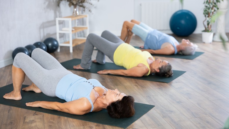 Three women in Pilates class