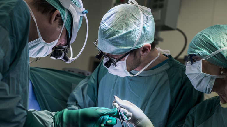 doctors at work during a surgery