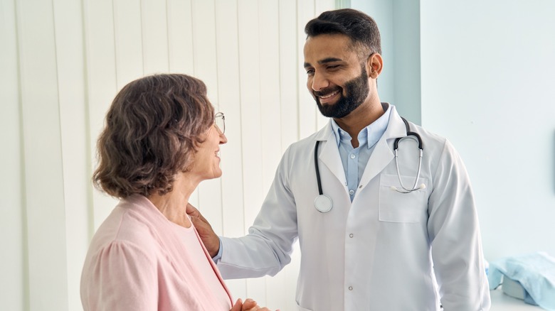 A doctor talks to a patient