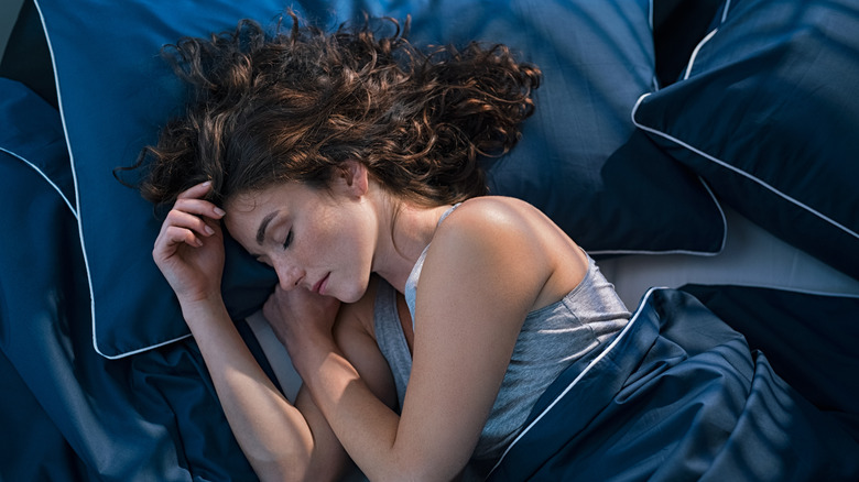 Woman sleeping in bed