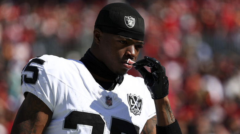 L.A. Raiders football player using smelling salts in 2024