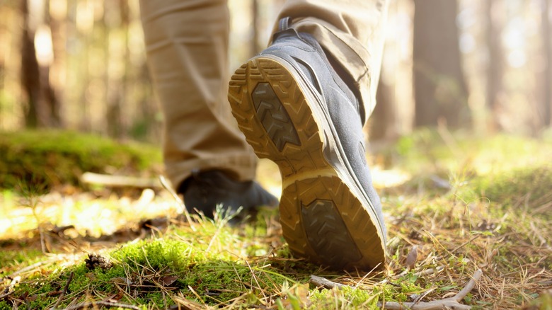 close-up of man's shoes walking away