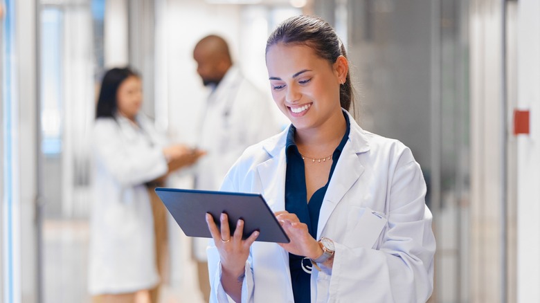 researcher entering data on a tablet