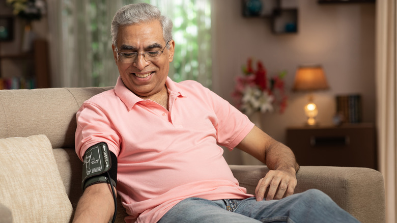 mature man smiling about blood pressure
