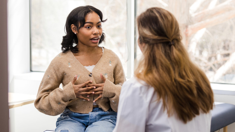 A female patient talking to her doctor