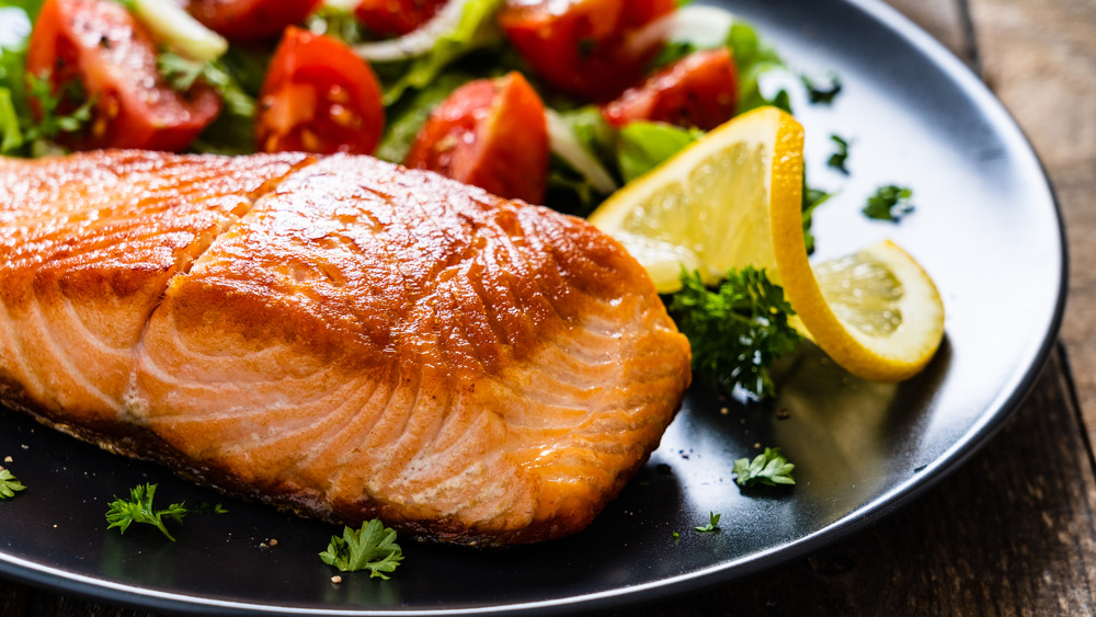 Close up of salmon with vegetables