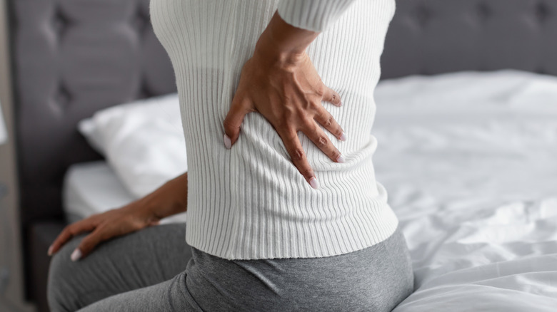 Woman suffering from pain in left side