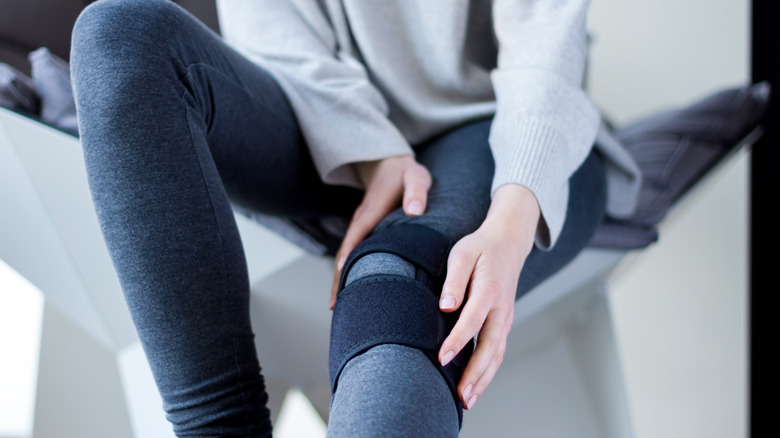 woman with a knee injury