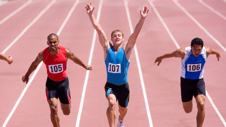 Runners on a race track